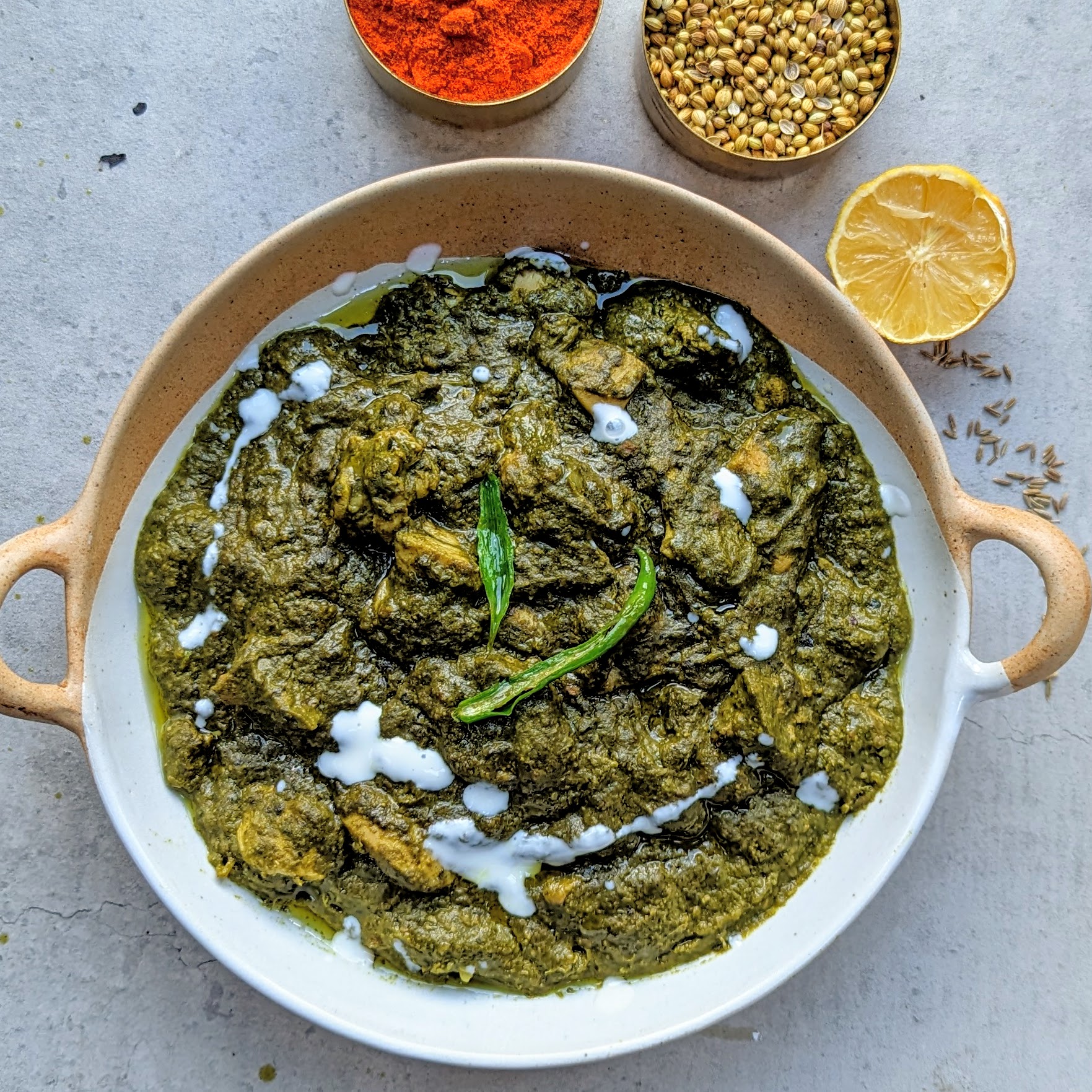 Saag ghost — lamb in spinach curry with spices and lemon
