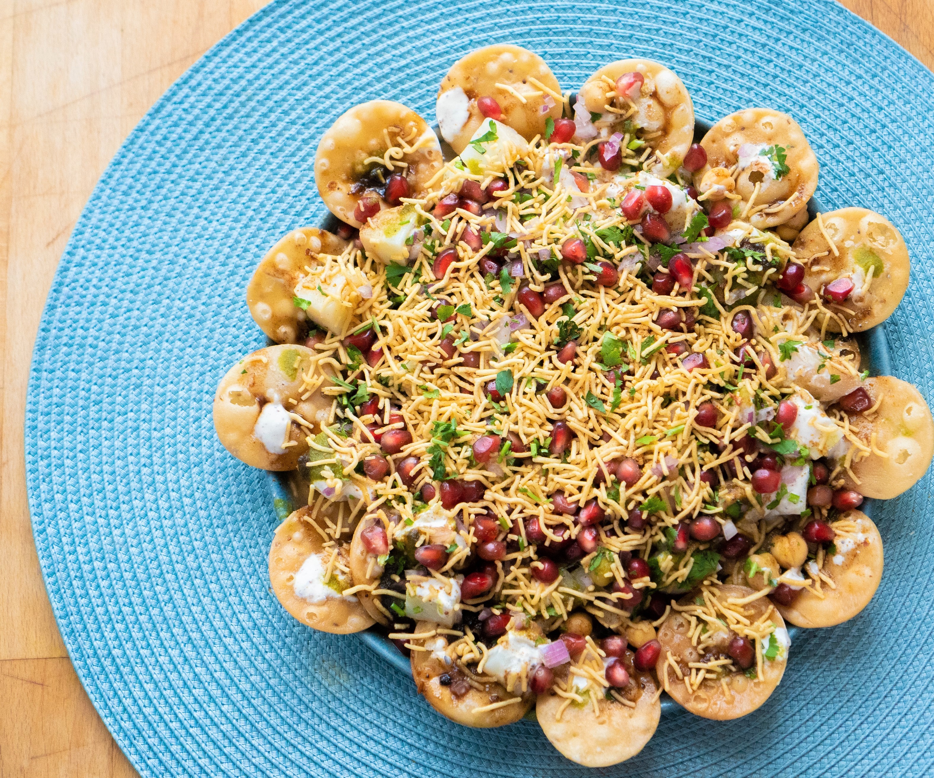 Papdi chaat with pomegranate, sev and chutneys