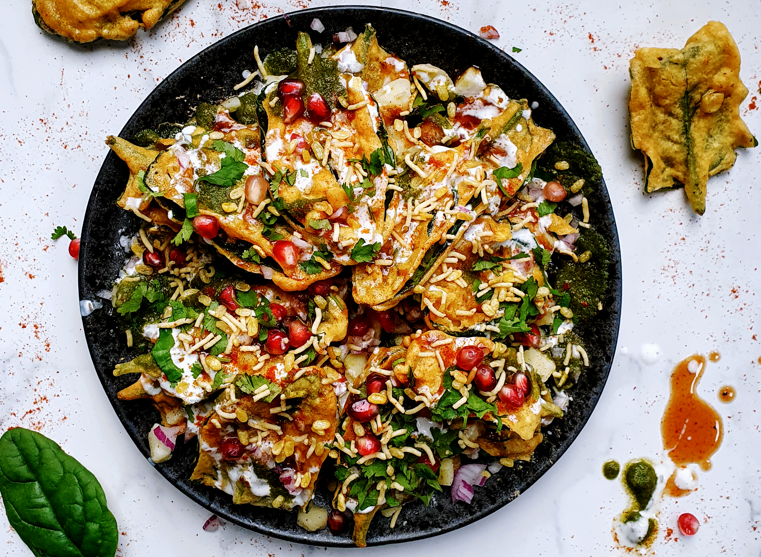 Palak patta chaat with yoghurt and tamarind